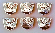 Sterling Silver Arnolt lapel pins with epoxy colored backgrounds hand-produced by Dwight H. Bennett.
