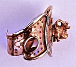 One-off Sterling Silver and 14K Gold “Horny Male Chauvinist Pig Ring” designed and hand-fabricated by Dwight H. Bennett.