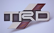 The First TRD Emblems used on Toyota’s high performance Supras for publicity photos in 1989 were designed and hand-fabricated by Dwight H. Bennett.
