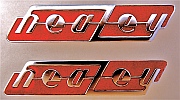 2 Healey Elliott Champlevé Badges after the original was repaired, molded and restored (above) and reproduced (below) by Dwight H. Bennett.