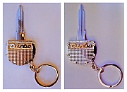 Porsche Turbo 14K Gold next to a Sterling Silver with bronze inset “turbo;” both Ignition Key Rings utilize factory key blanks, and are both designed and hand-fabricated by Dwight H. Bennett.