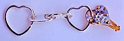 One-off Sterling Silver Link-Lock Come-Apart key ring stamped with hearts and sterling silver heart-shaped split key rings designed and hand-fabricated by Dwight H. Bennett.