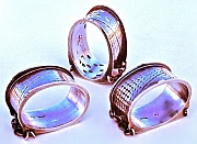A set of 3 Similar Sterling Silver One-off Napkin Rings made for one family, designed and hand-fabricated by Dwight H. Bennett.