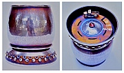 Bruce Hazard’s 60th Birthday Sterling Silver Cup; hand-raised with rotating truck on the bottom, set with a ruby and designed and hand-fabricated by Dwight H. Bennett.
