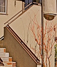 38’ (in six sections) of Custom Solid Copper Rod Stair Railing with custom finials were designed and hand-hammer textured by Dwight H. Bennett.