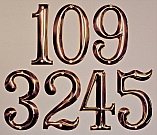 Sears Catalog House Numbers after original steel numbers disintegrated; meticulously reproduced (and cast in bronze) by Dwight H. Bennett. 